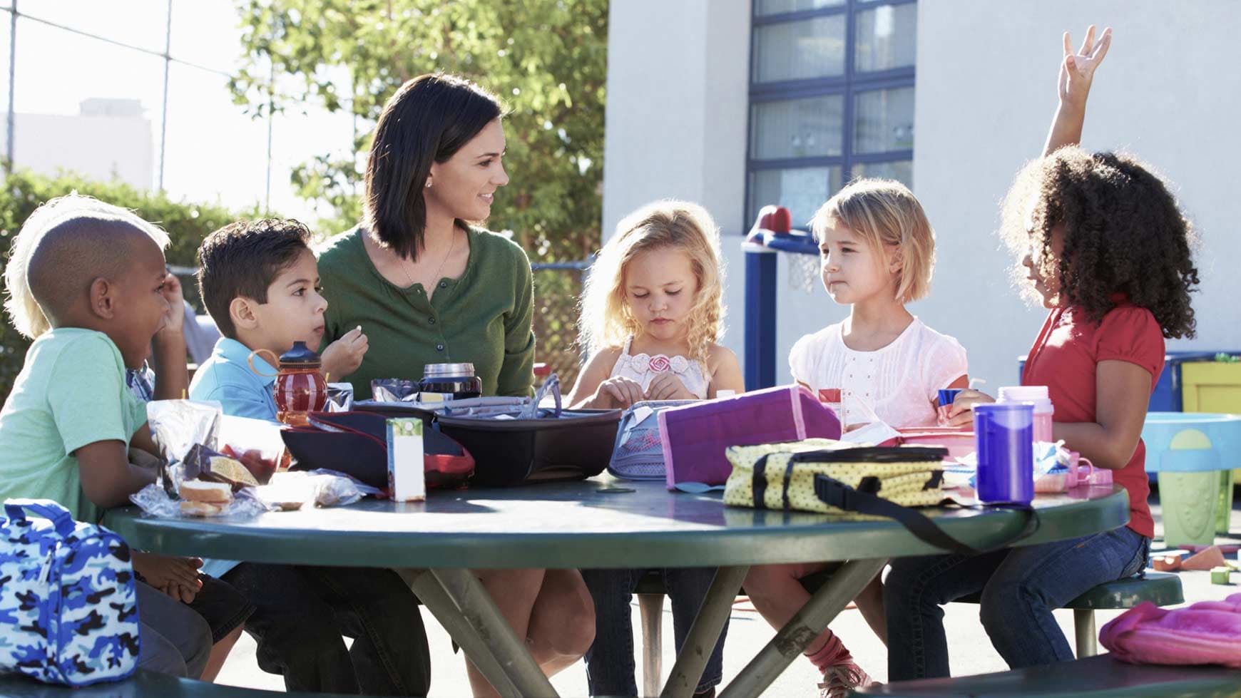 After School Programs - Children at picnic table